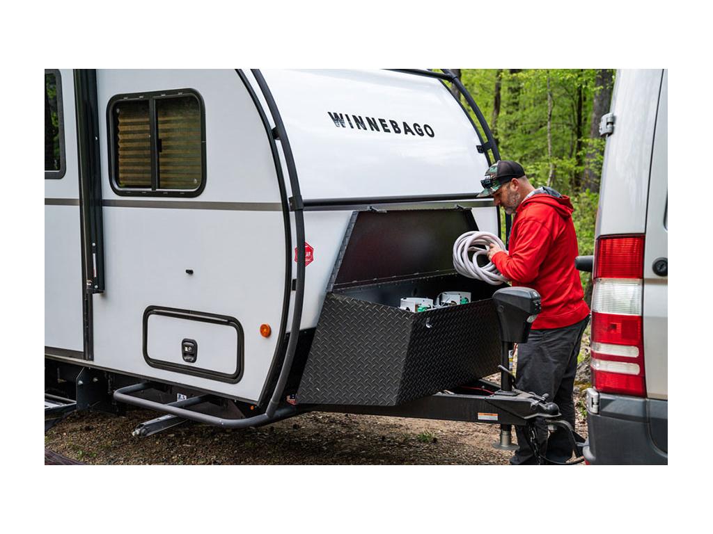 Peter taking out water hose from HIKE tongue box