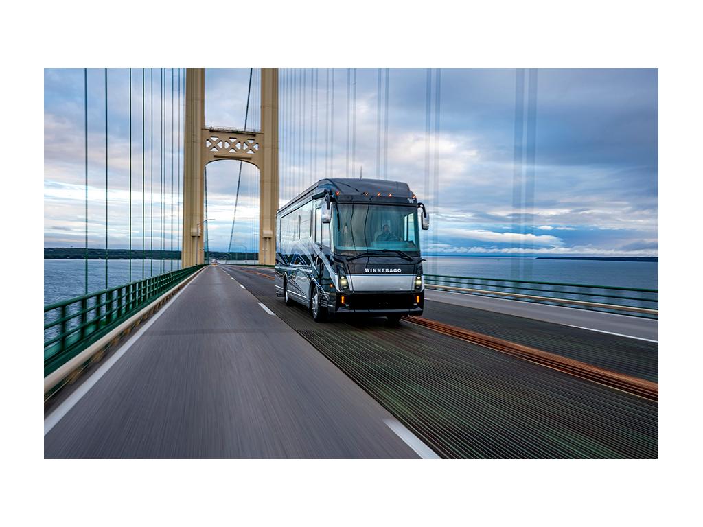 New Winnebago Journey driving on bridge