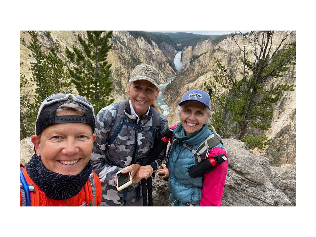 Chris and Noel hiking with a friend