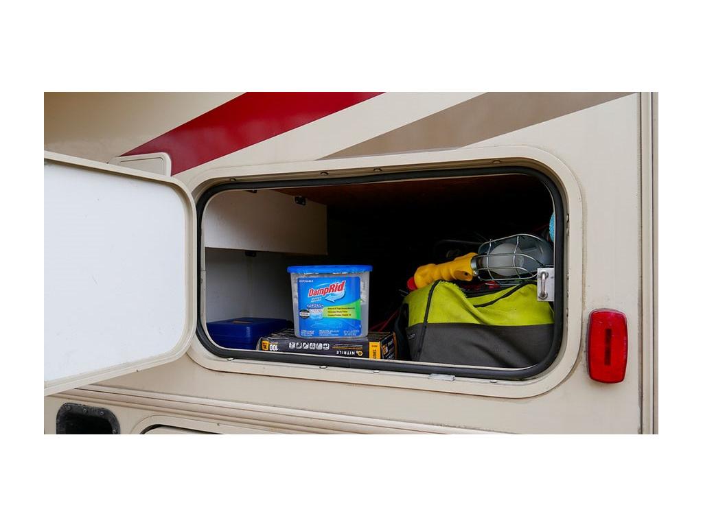 Damprid stored in outside storage compartment to keep RV dry