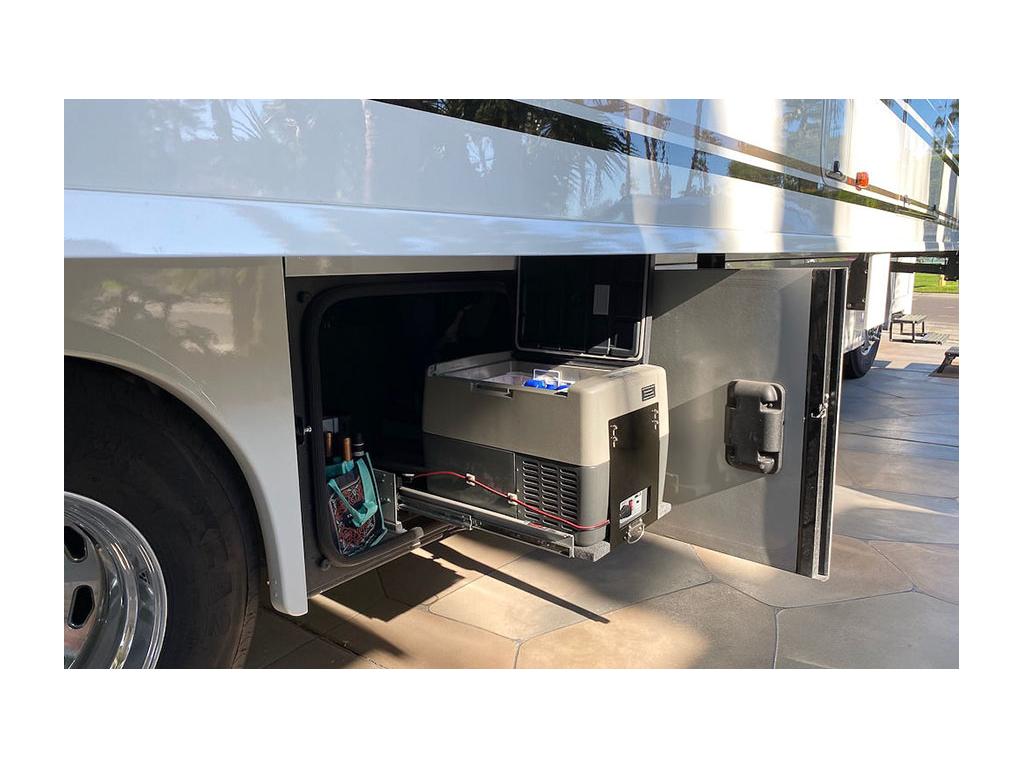 Norcold electric dual-use refrigerator/freezer in basement compartment