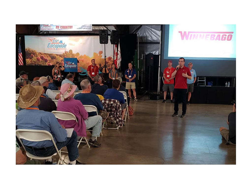 Nick Davis from Winnebago giving presentation to crowd during Escapade