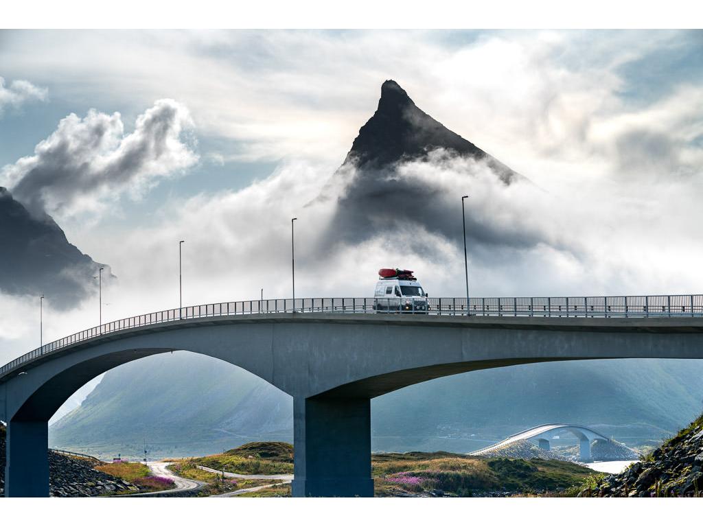 Winnebago Revel driving across a bridge