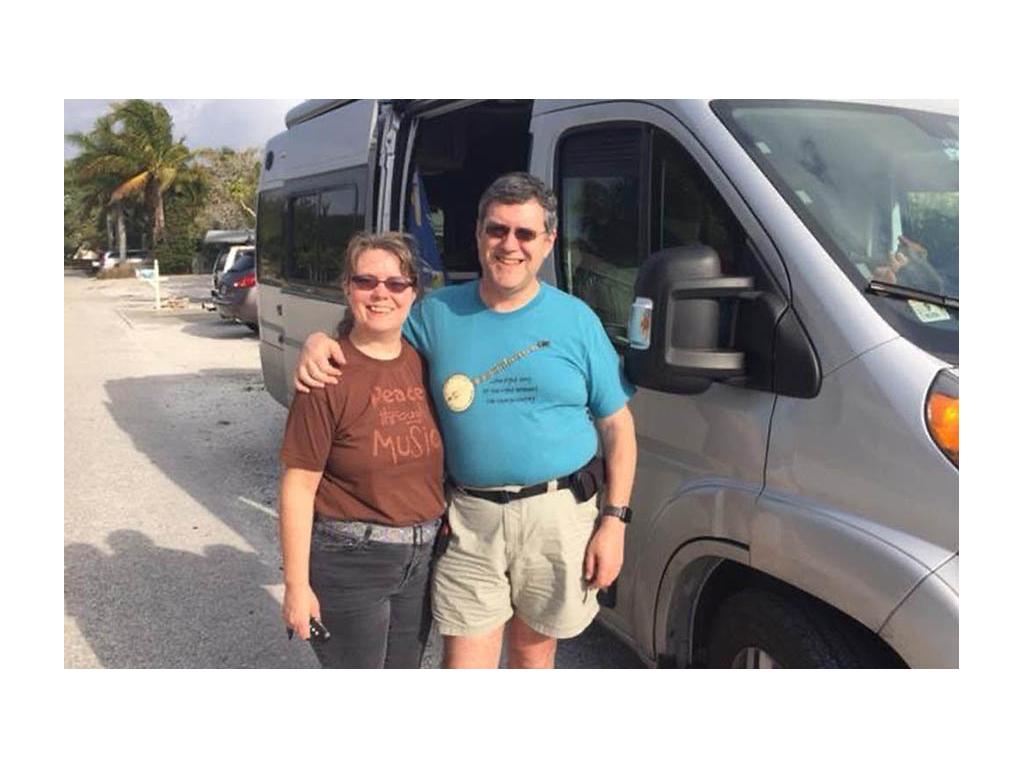 Faith and Daniel standing together in front of Travato