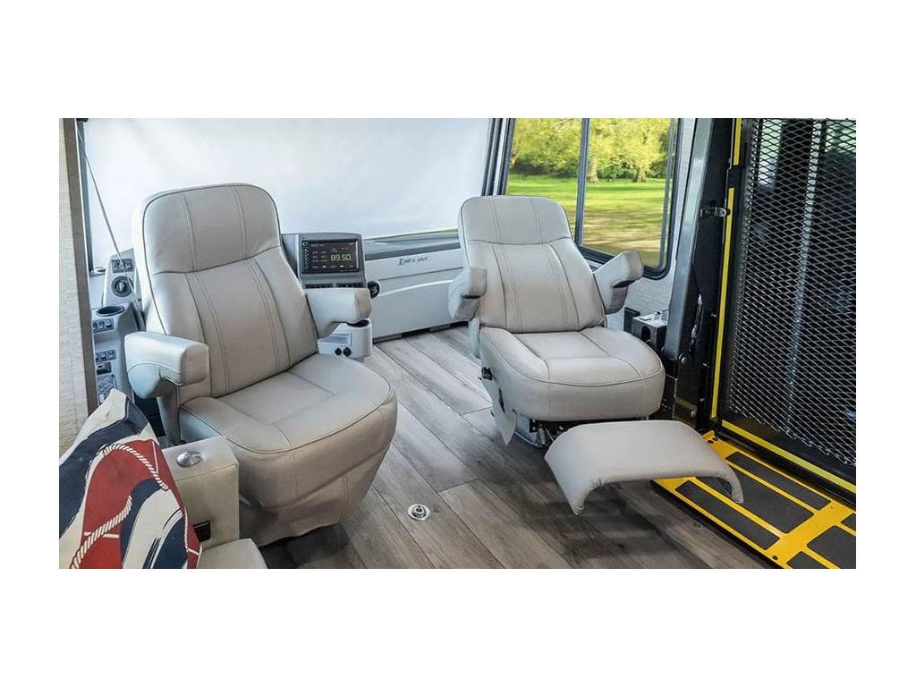 Captain and passenger seat swiveled to face cabin in Winnebago Inspire