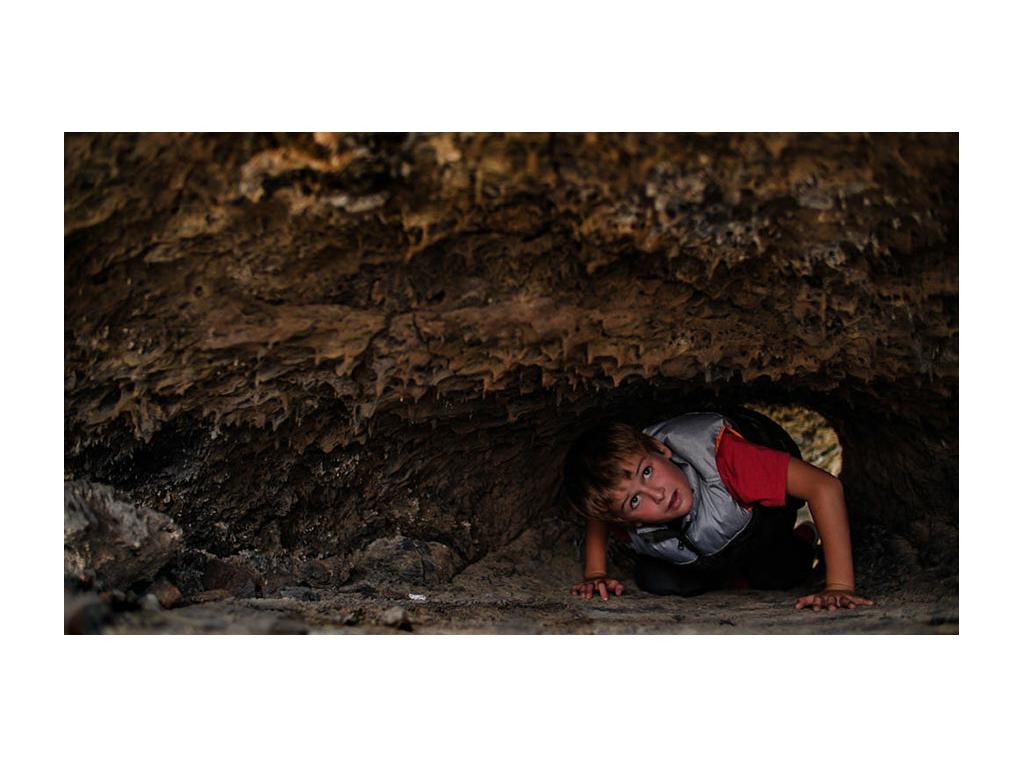 Dakota exploring the lava tubes in the park