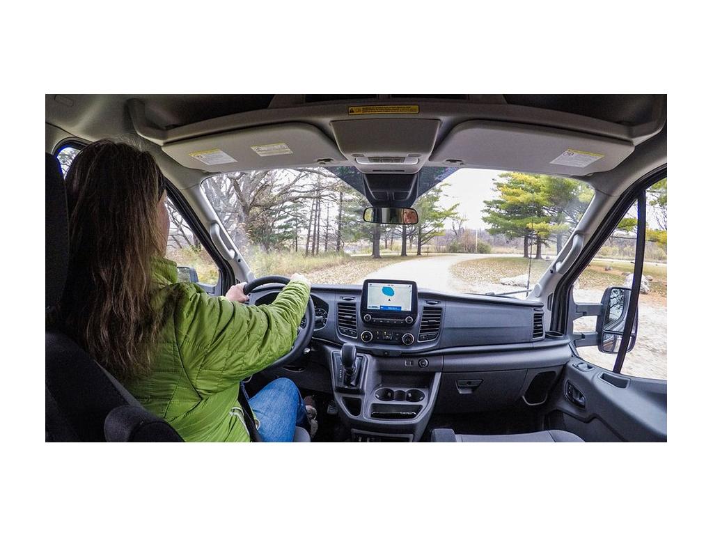 Looking through windshield as Kathy Holcombe drives the EKKO