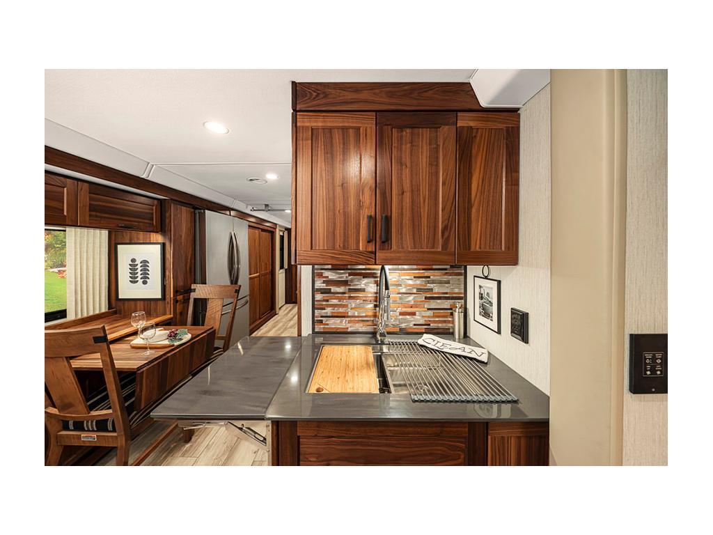 Kitchen sink and table in the Winnebago Journey