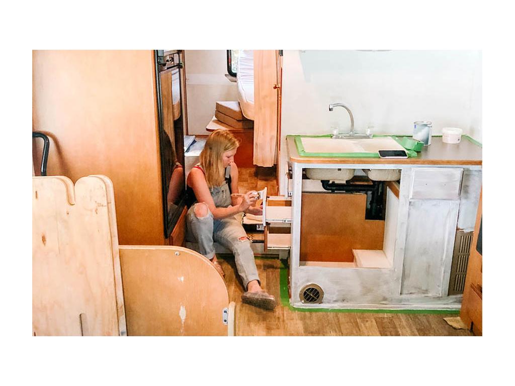 Tera painting interior of Minnie Winnie