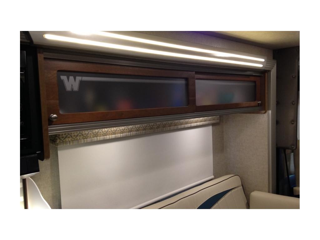 Cabinet above couch.