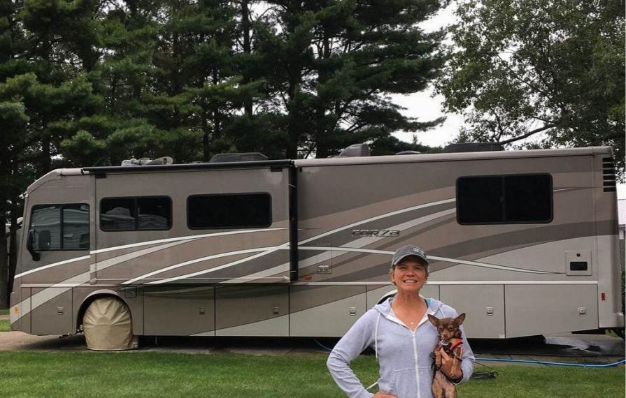 Lin holding Wally in front of Forza