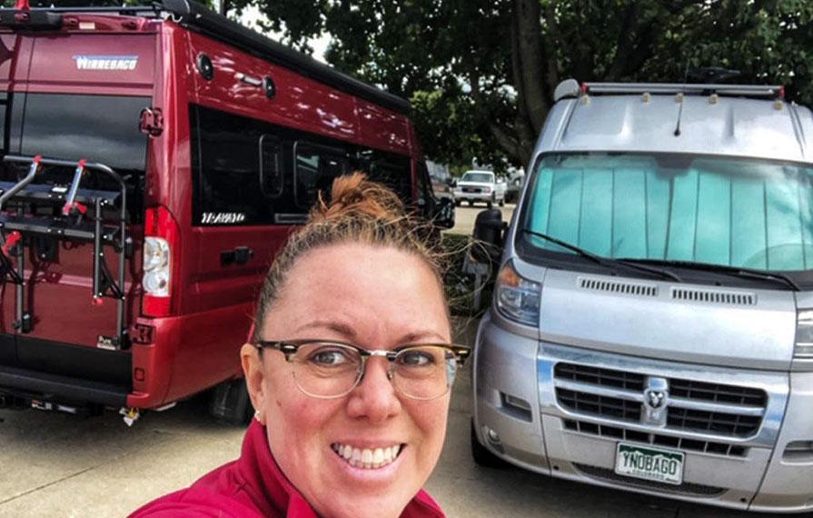 Jenny taking a selfie with the new and the old Travato