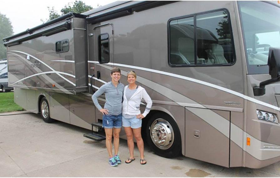 Ann and Lin standing in front of Forza