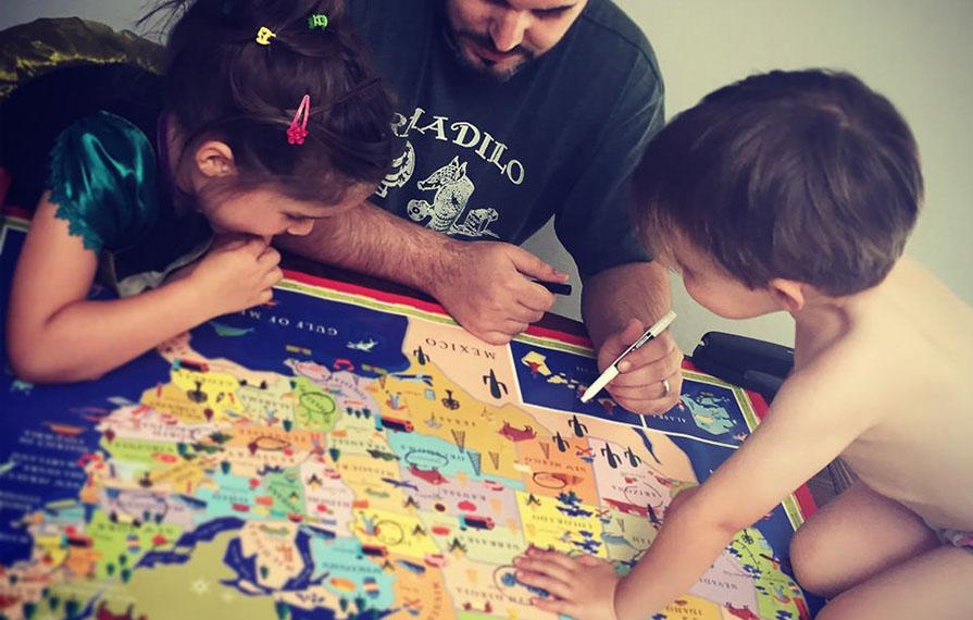 David and the kids looking at map