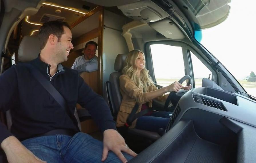 Lindsay driving RV with Dan in passenger seat