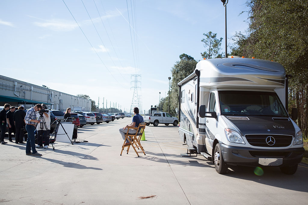 Jordan being interviewed in front of Winnebago View.