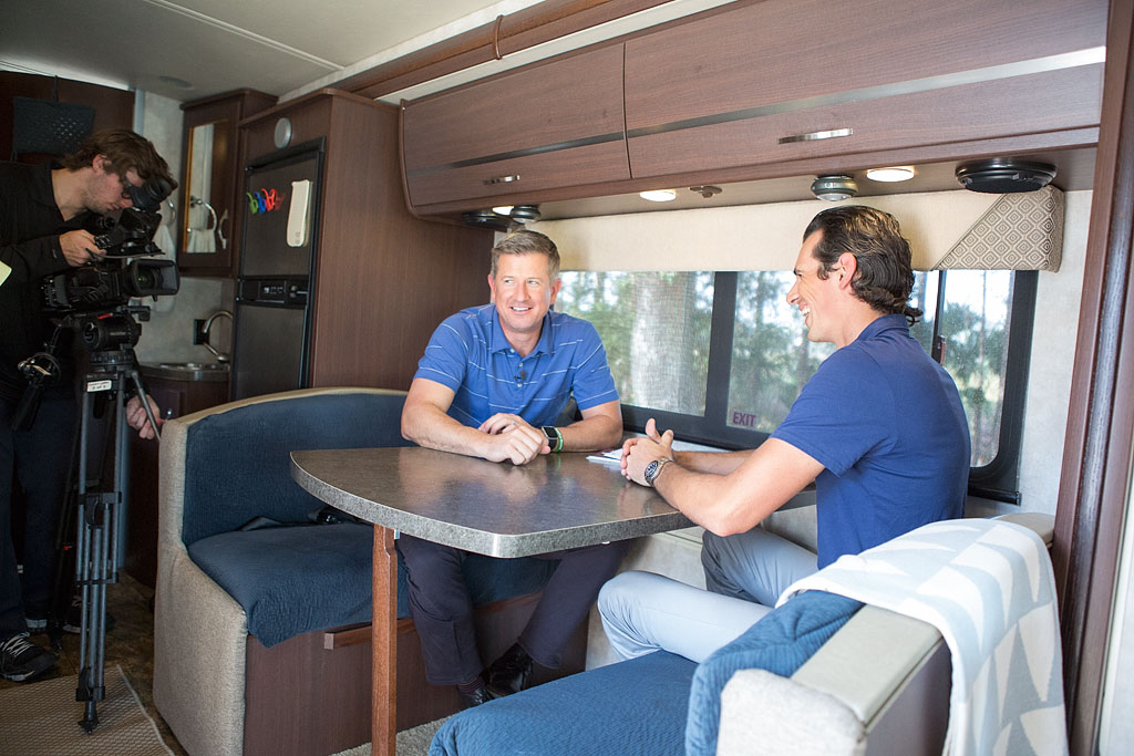 Jordan and Matt Ginella at Winnebago View Dinette talking.