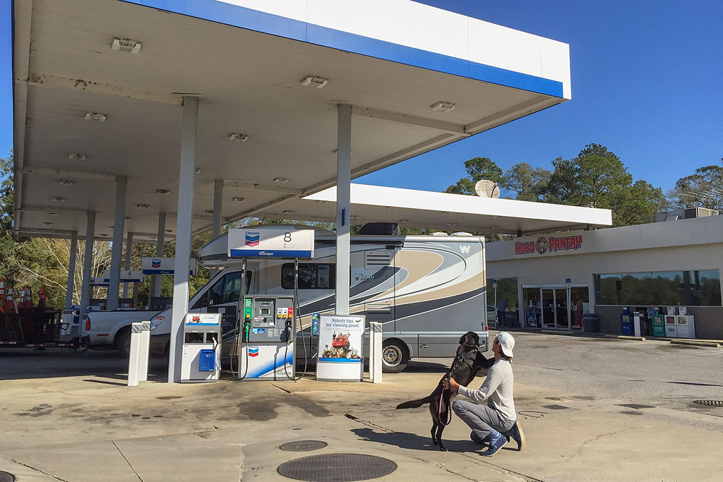 Winnebago View being filled at a gas station.