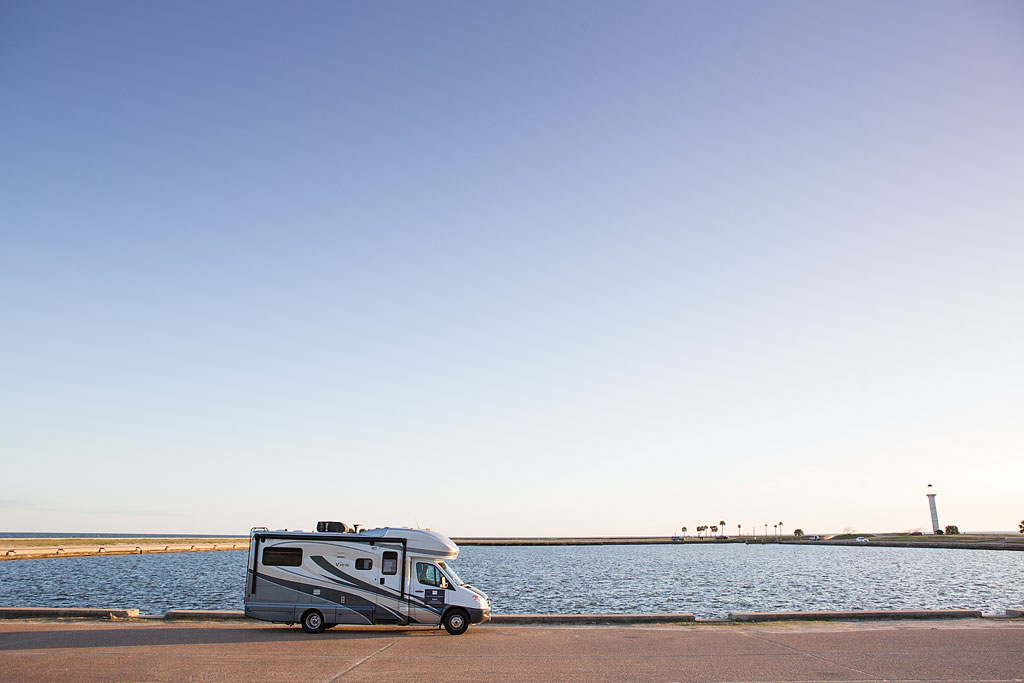 Winnebago View parked along the water.