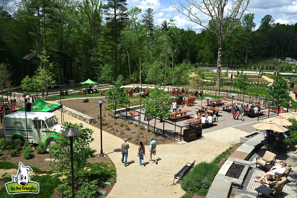 Outside patio area with picnic tables and benches.