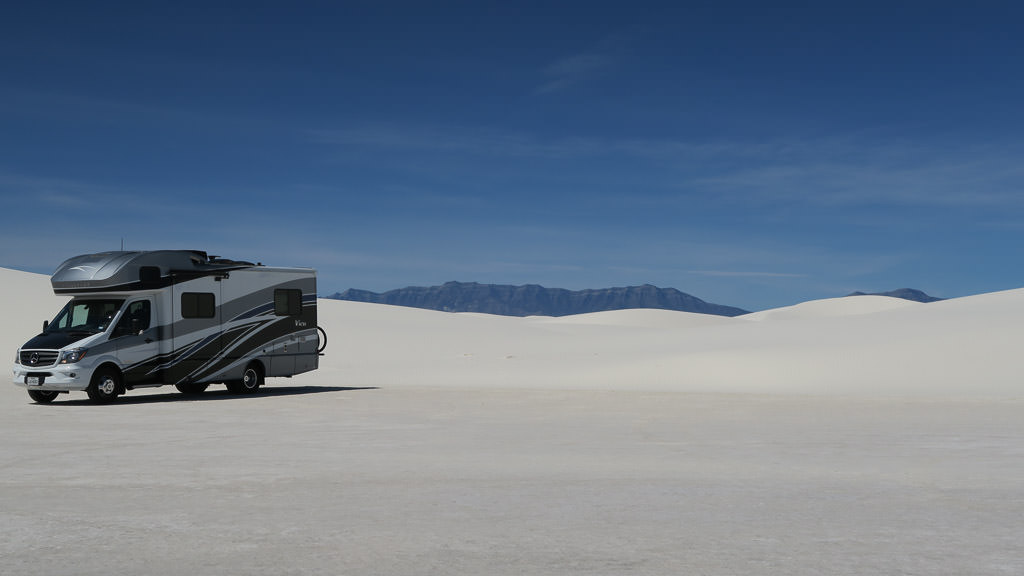 Winnebago View parked on the white sand dunes of White Sands National Monument.