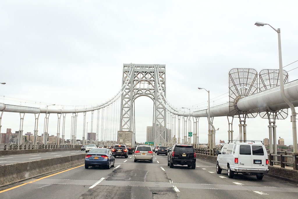 Traffic backed up on bridge. 