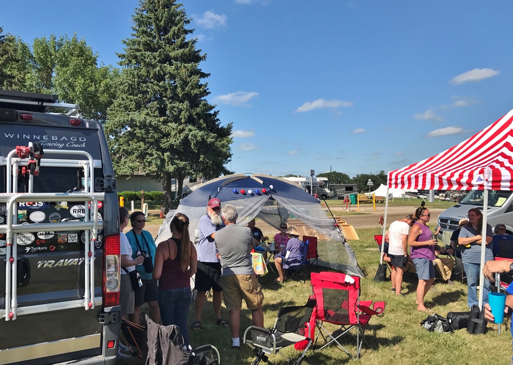 People socializing at Winnebago Grand National Rally.