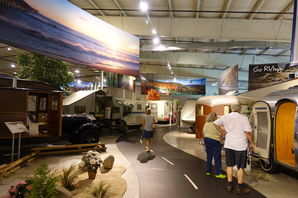People looking at RV's in the RV/Motorhome Hall of Fame