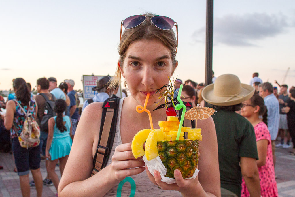 Katharine sipping from a unique drink 