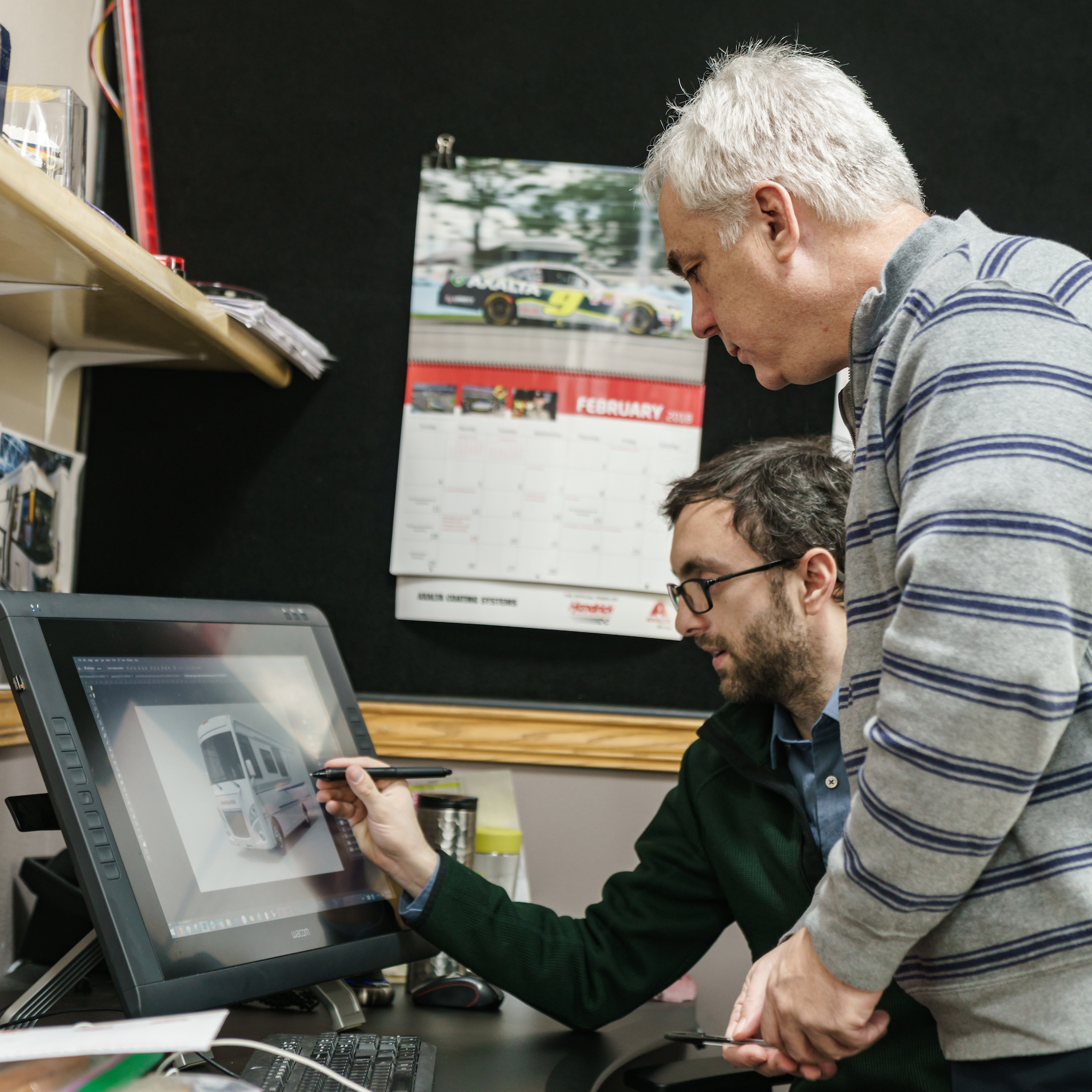 Matt Clements reviewing a photo of the Winnebago Intent on his computer.