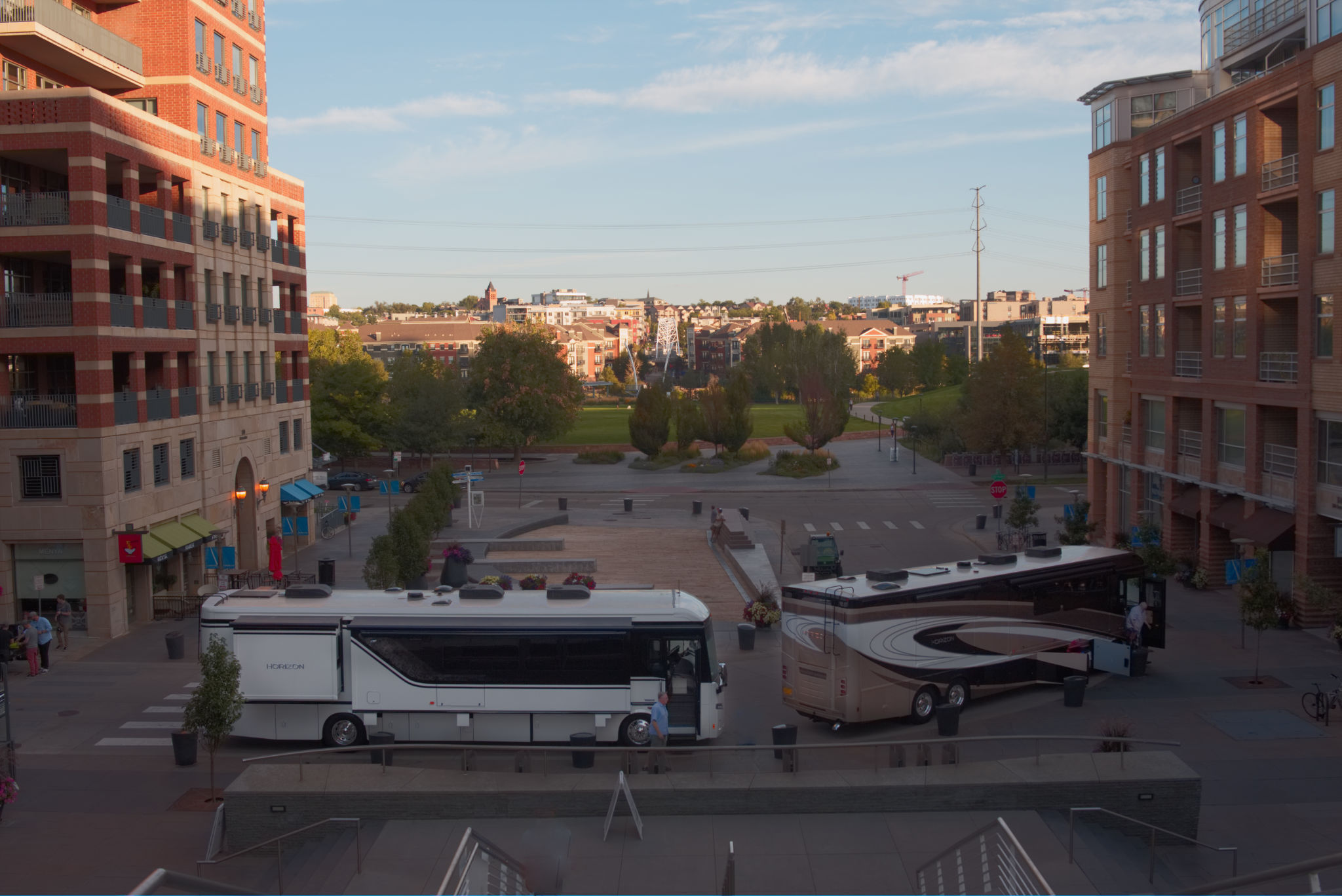 Two Winnebago Horizon motorhomes parked at a turn-around in downtown Denver.