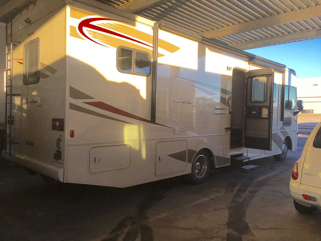 Winnebago Sunstar parked in storage site.