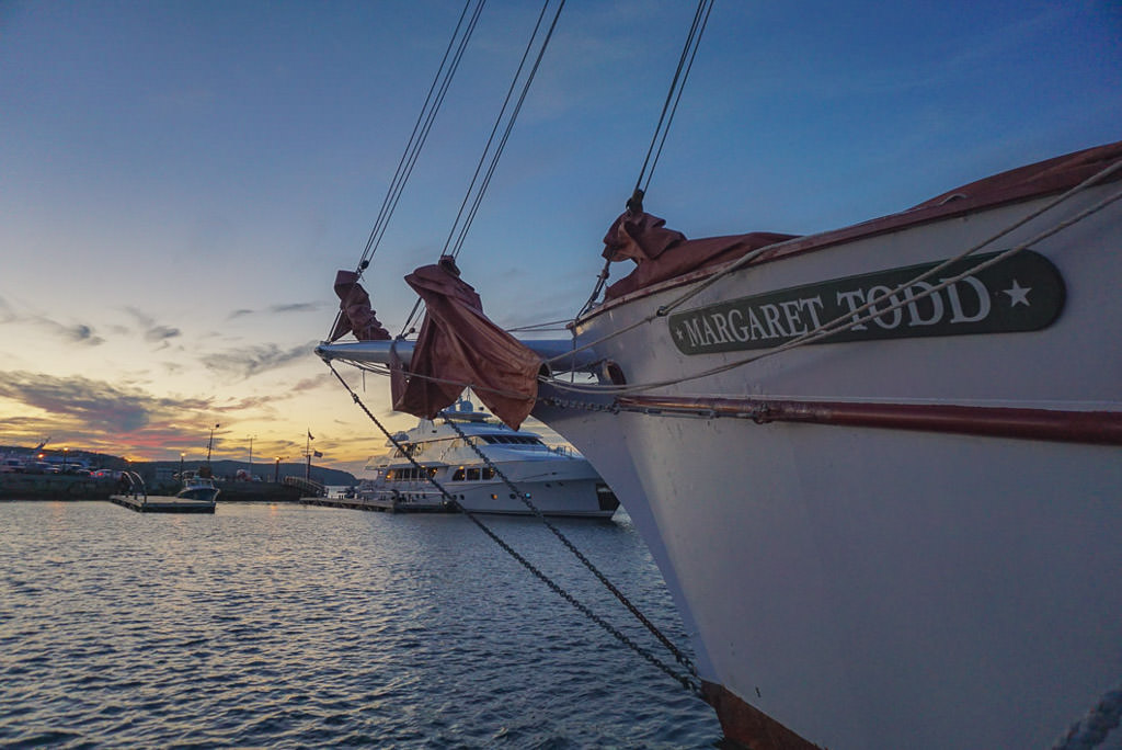 Boats on the harbor at sunset