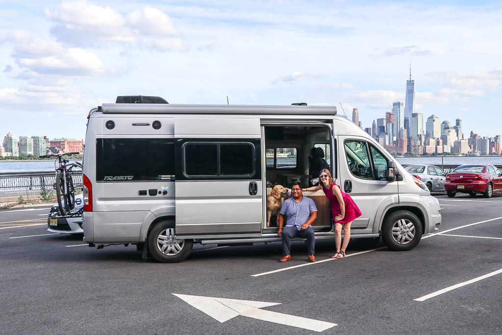 Katharine, Humberto, and Lucy sitting in Travato entryway