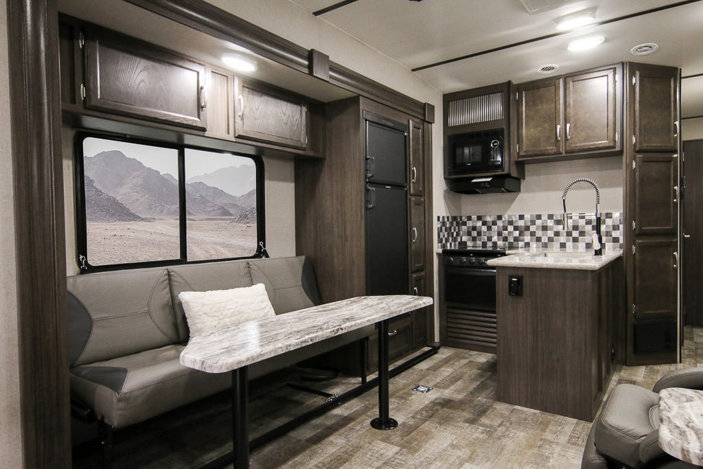 Kitchen and dinette of Winnebago Spyder.