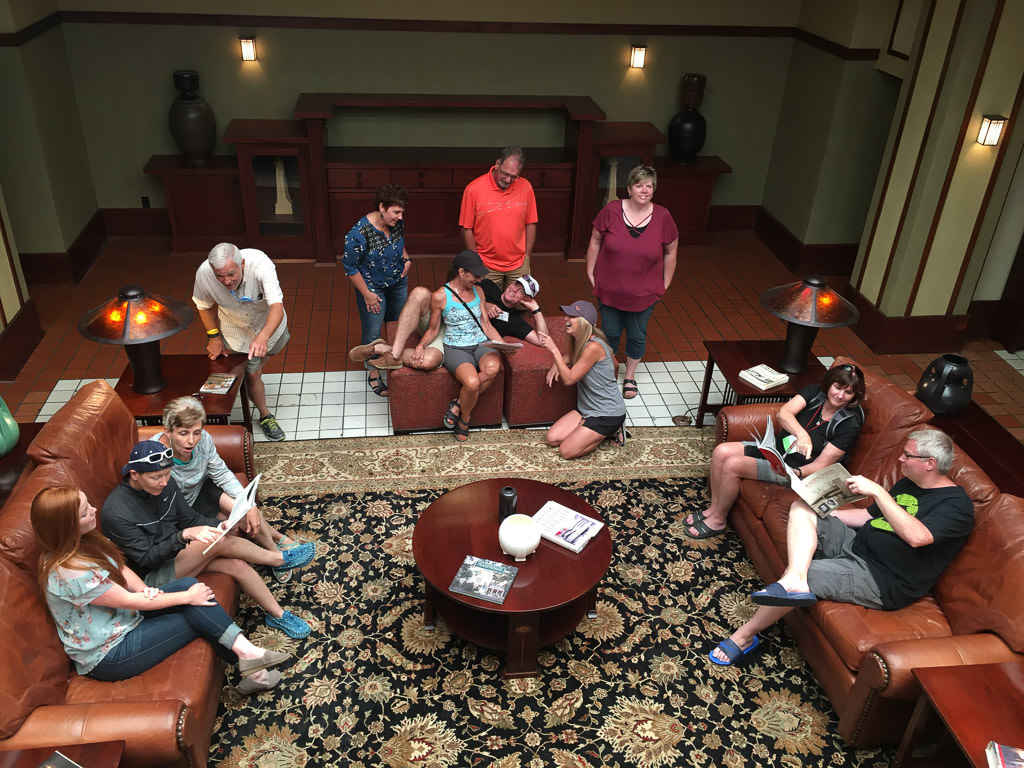 Group of people sitting in lobby area of Historic Park Inn.