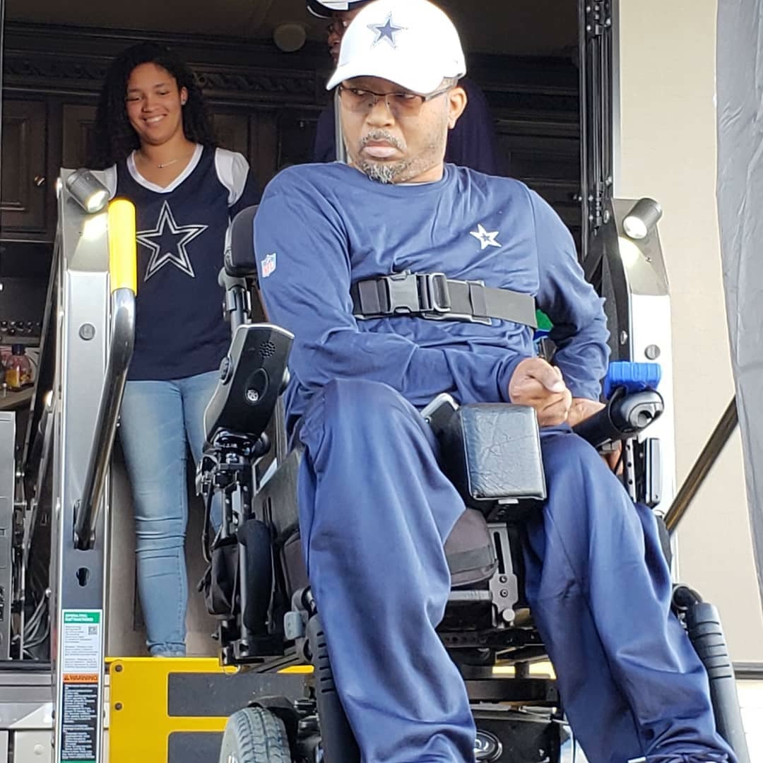 Jerome on wheelchair lift.