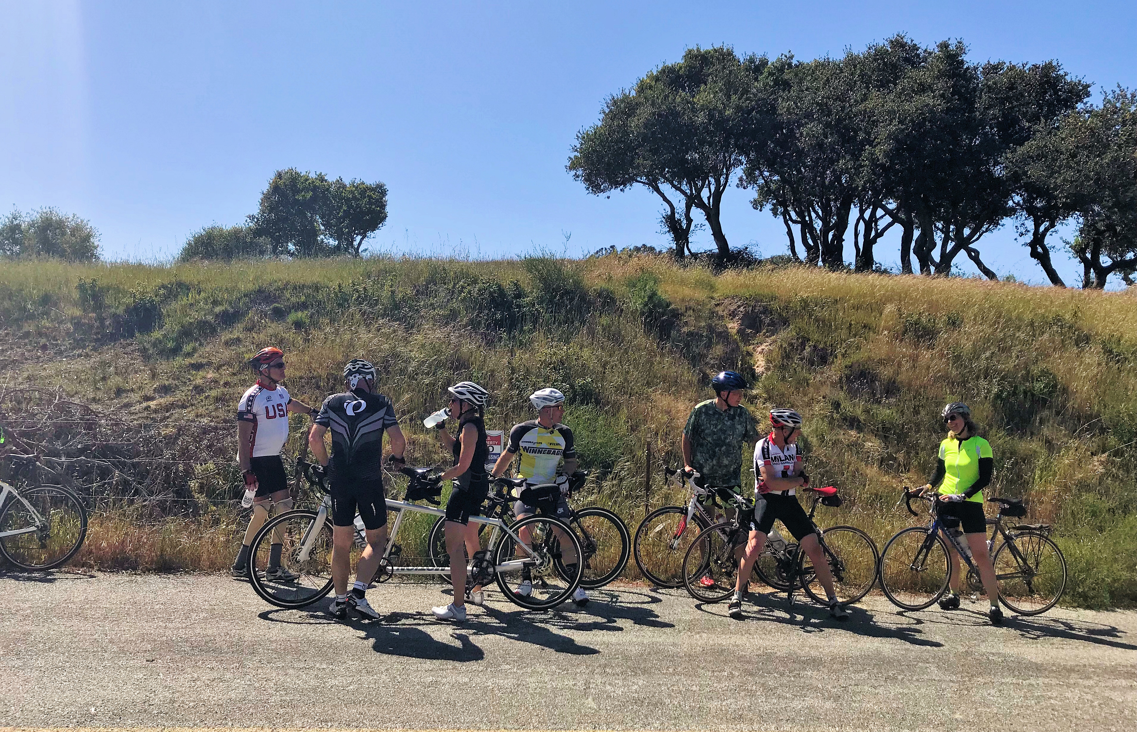 Winnebago camping attendees on group bike ride led by Stef