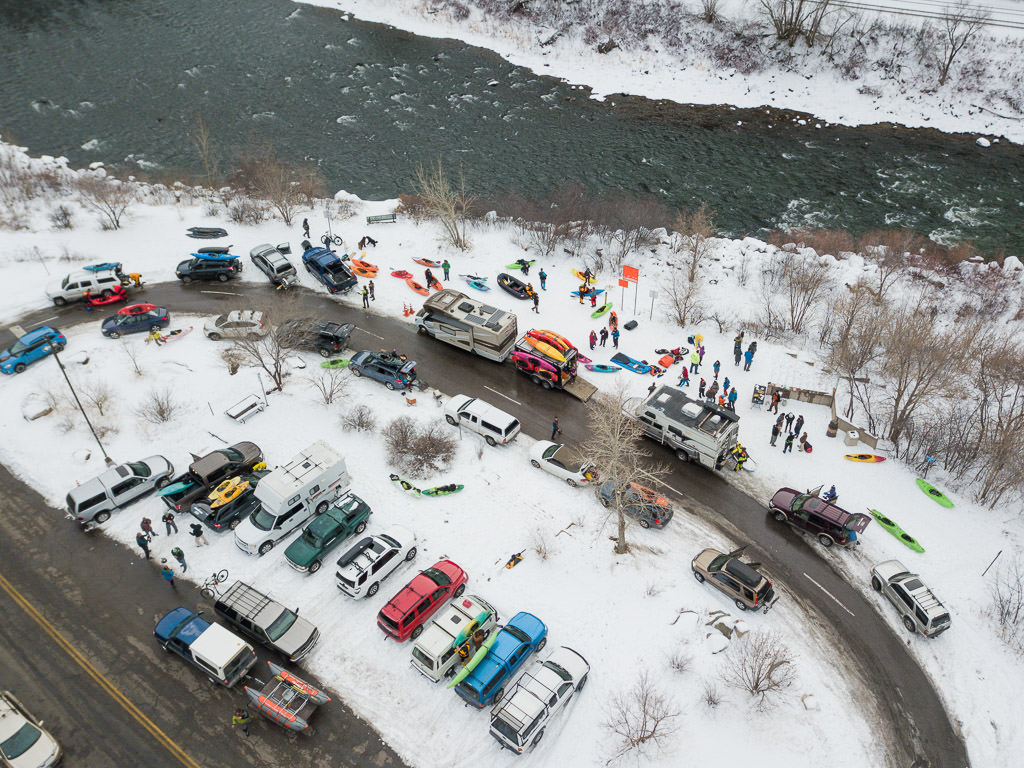 RVs, Vehicles and many people ready to take kayaks and rafts out on the Colorado River