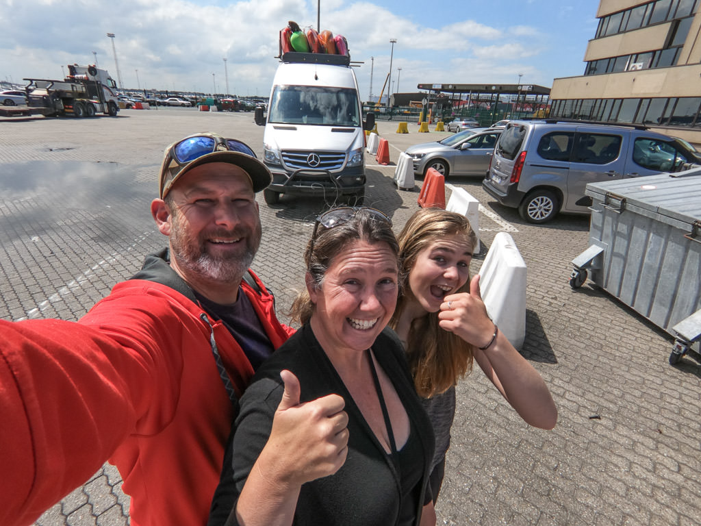 The family out front of their Winnebago View after being reunited after it was shipped.
